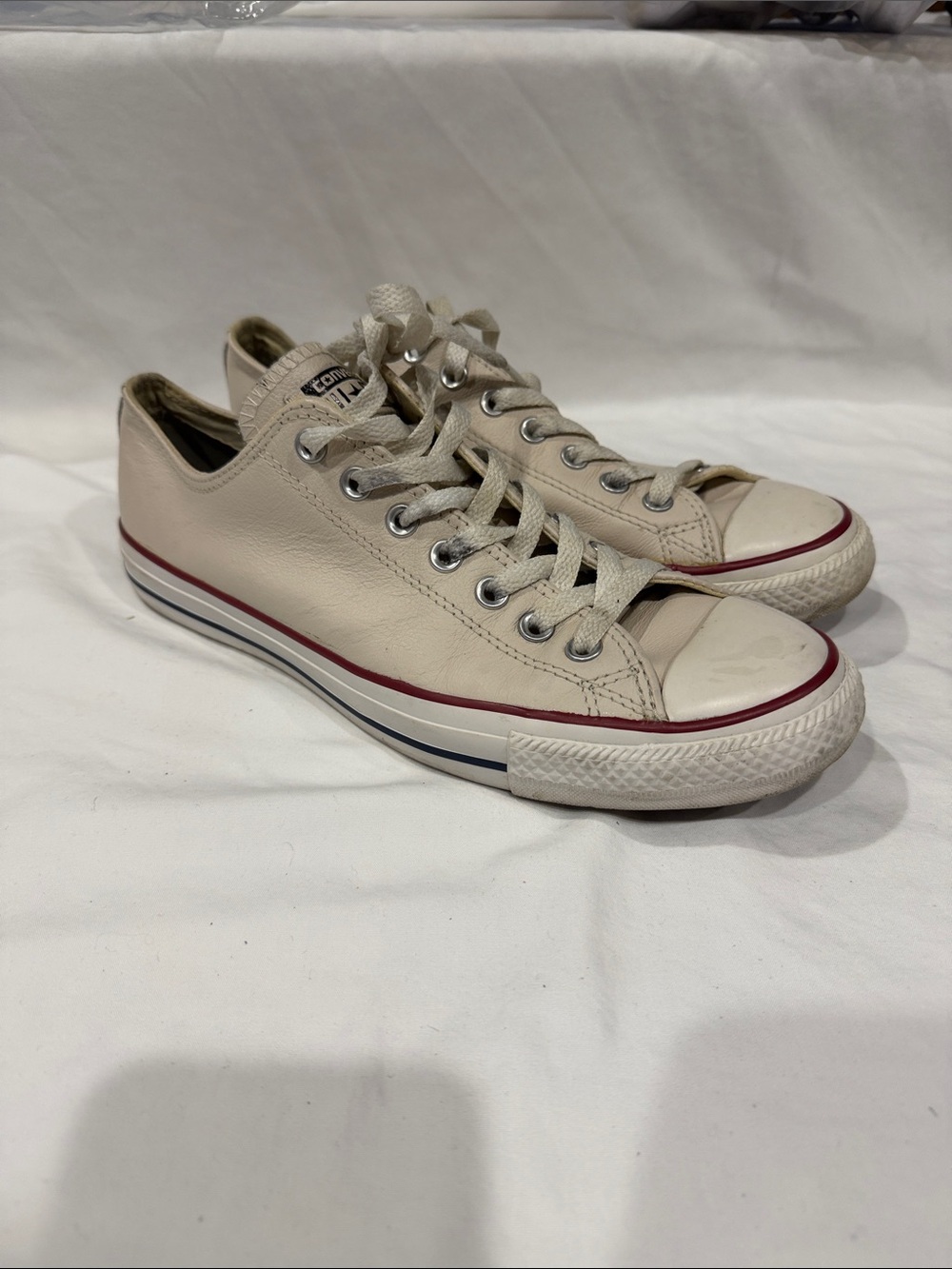 Converse Low Top Leather Sneakers in Cream with Red & Blue Trim
